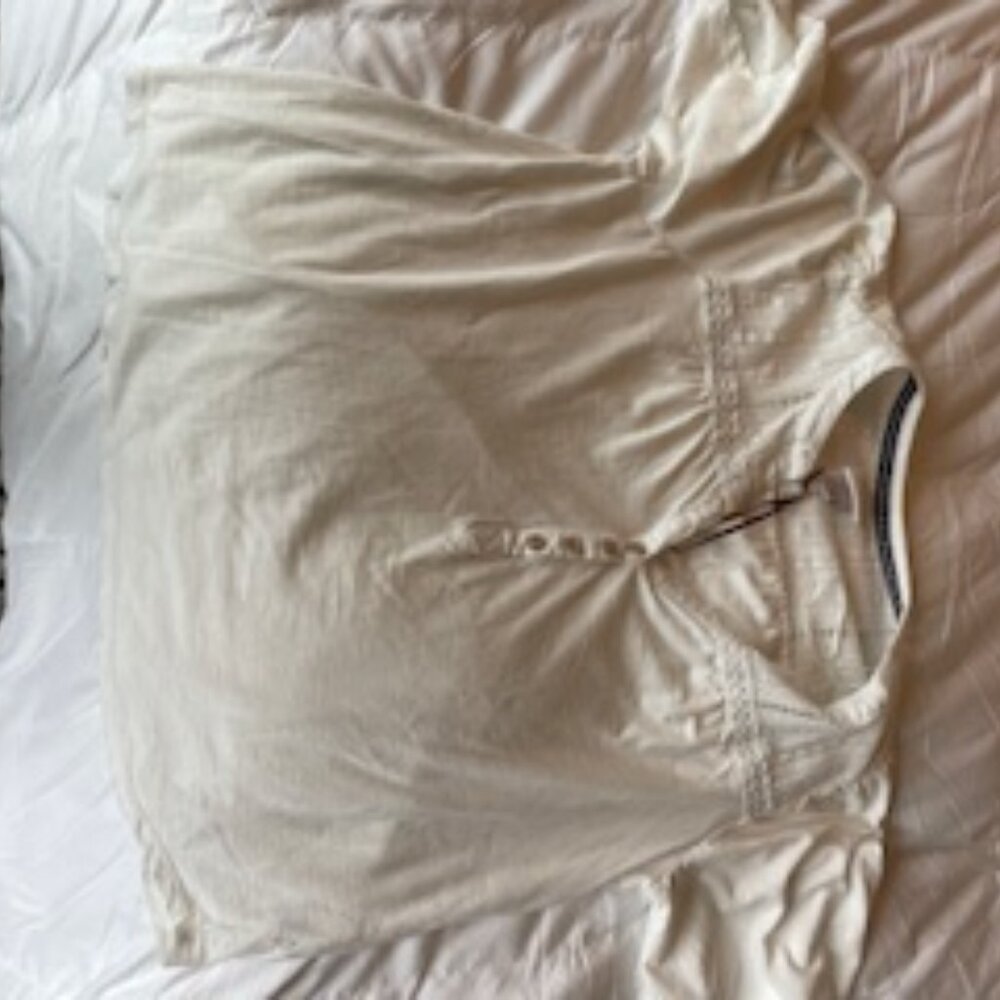 Cream short sleeved t-shirt, perfect condition